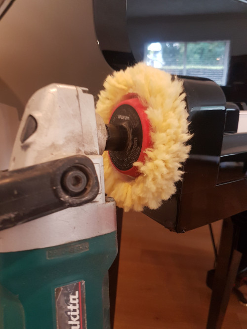 Use a buffing wheel to bring up the sheen